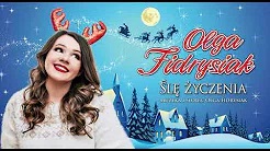 Piosenka Ślę życzenia - wokalistka Olga Fidrysiak na zimowym tle.